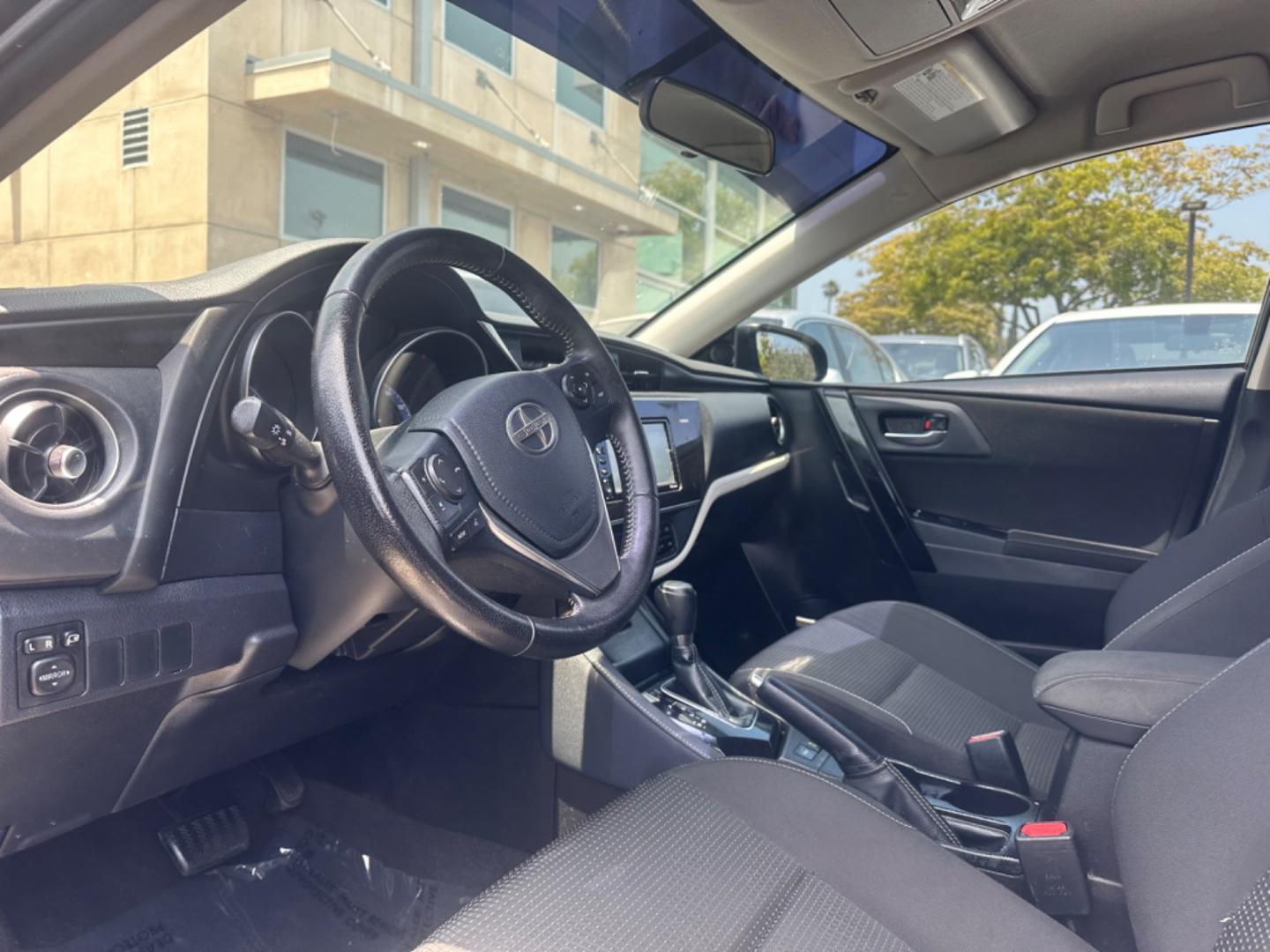 2016 Black /Black Scion iM Cloth (JTNKARJE7GJ) with an 1.8 4 Cylinder engine, Automatic transmission, located at 30 S. Berkeley Avenue, Pasadena, CA, 91107, (626) 248-7567, 34.145447, -118.109398 - 2016 Scion iM 1.8: Your Ideal Pre-Owned Hatchback in Pasadena, CA When searching for used BHPH cars in Pasadena, CA, the 2016 Scion iM 1.8 stands out as a premier choice. This versatile hatchback combines efficiency, style, and practicality, making it a highly sought-after vehicle in the pre-owned - Photo#5